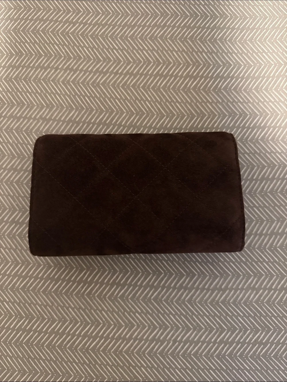 Tory Burch Willa Suede wallet on a chain.